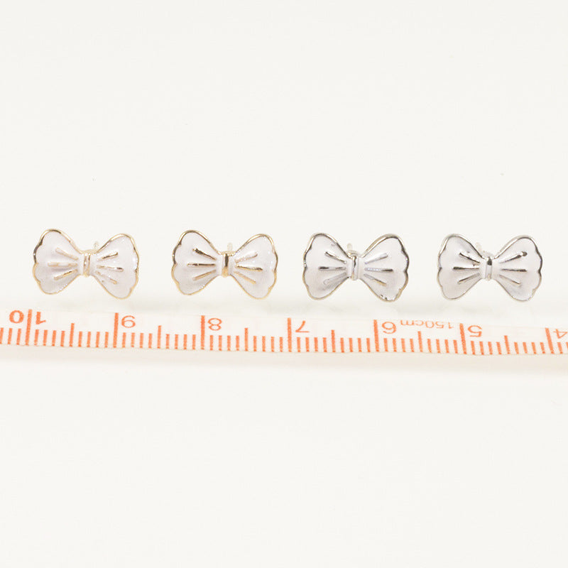 White Bow Stud Earrings