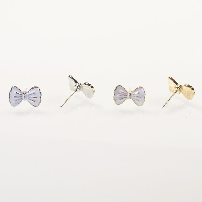 White Bow Stud Earrings
