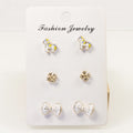 Bow pony earring set