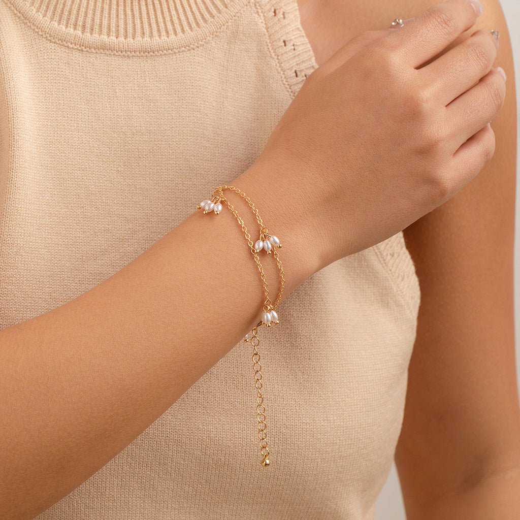 Elegant Faux White Pearl Necklace with Long Gold-Plated Tassels