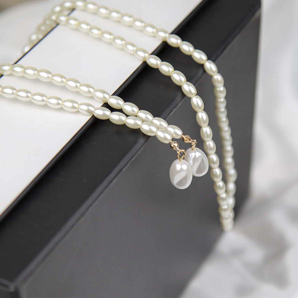 Vintage Long Glass Oval Pearl Necklace with Small Pearls
